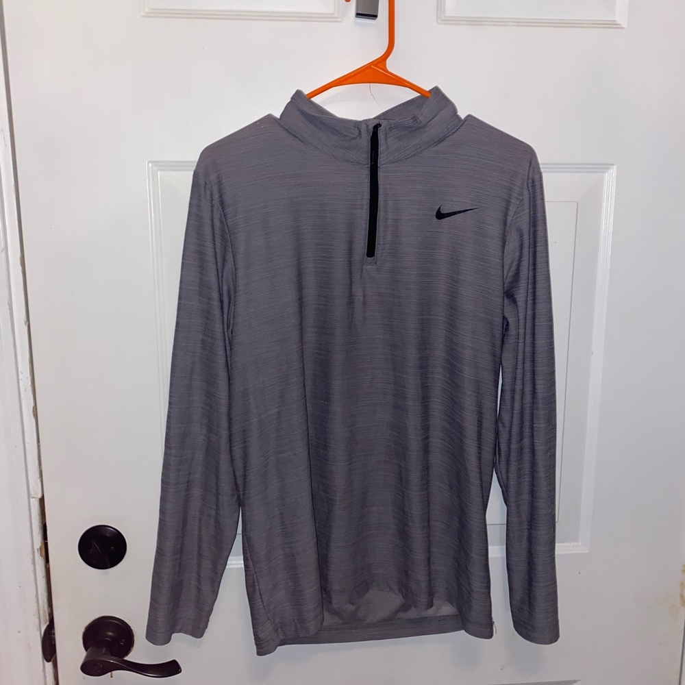 Men’s Nike Dri-Fit 1/4 zip long sleeve shirt. Sz.sm in like new condition